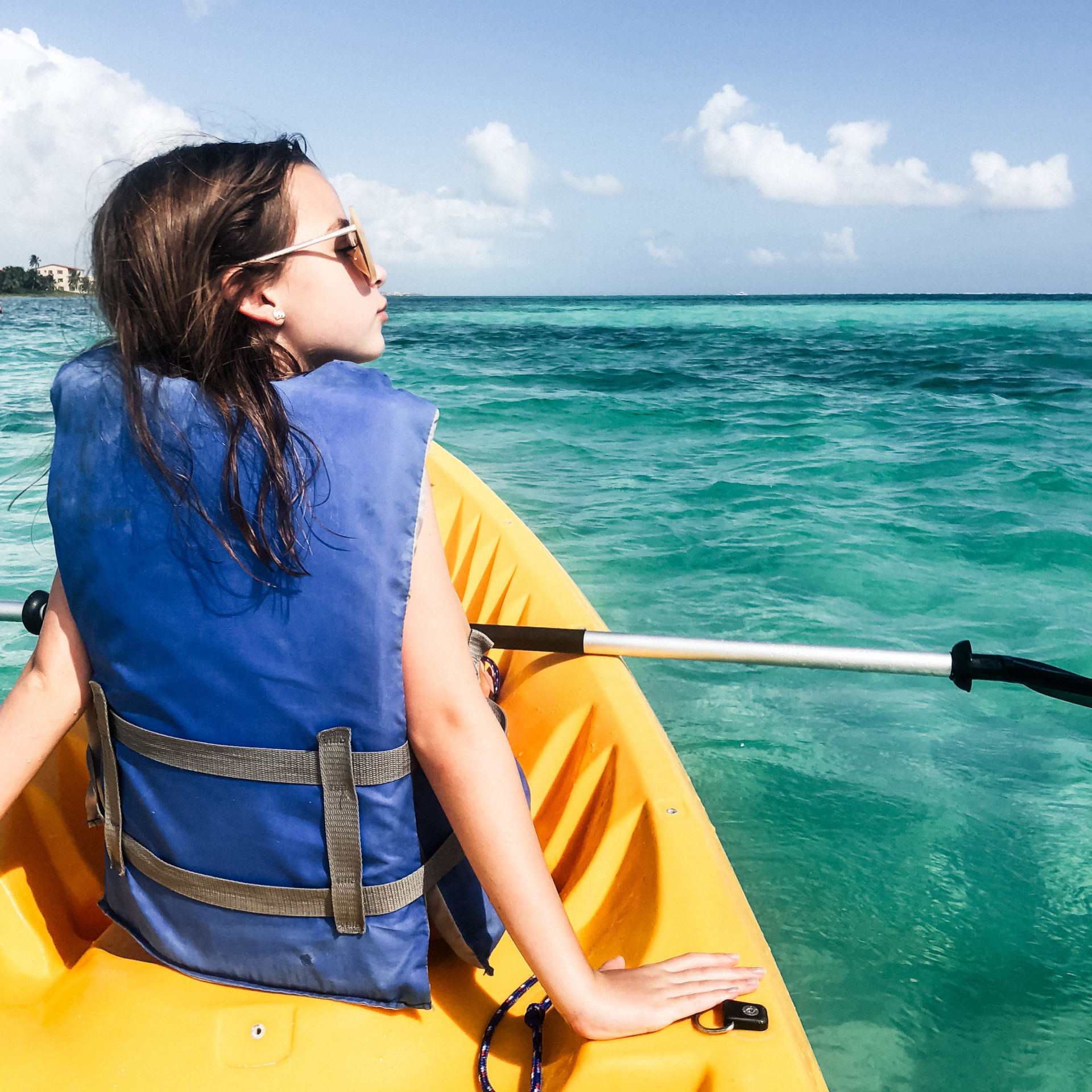 Lisa Breckenridge kayaking with family in Belize