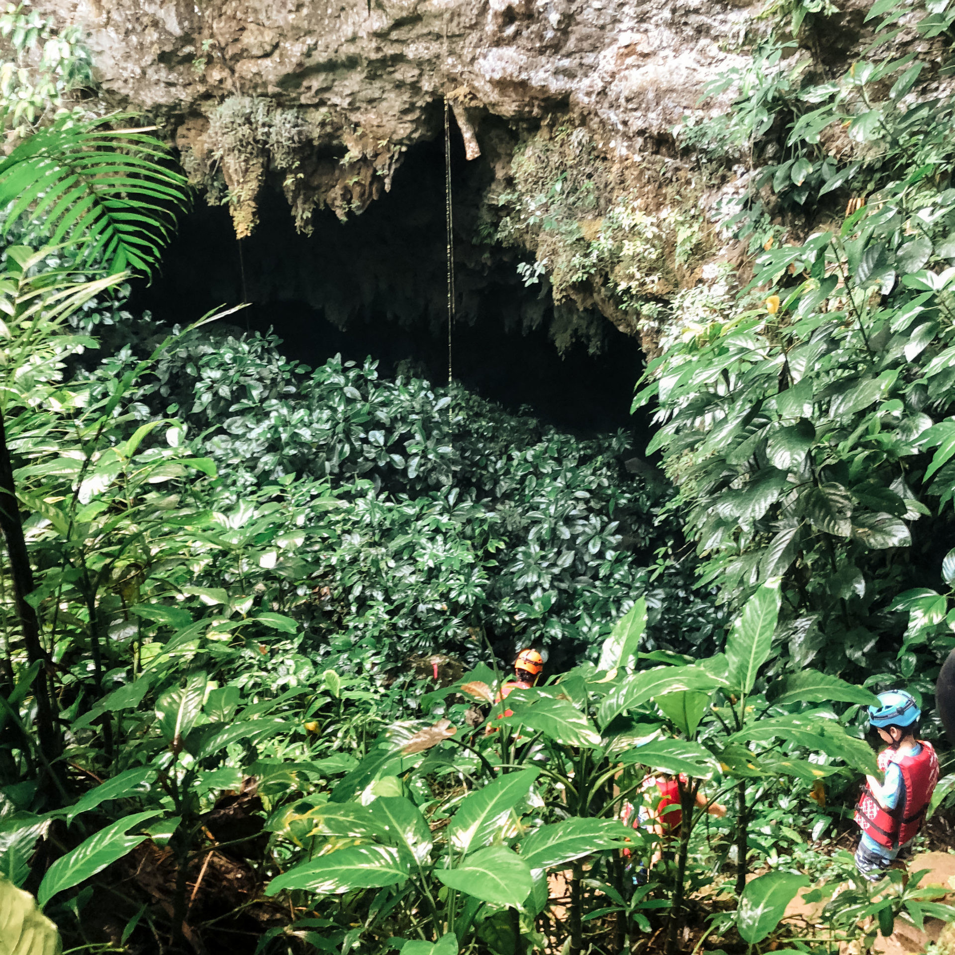 Lisa Breckenridge exploring caves with family in Belize